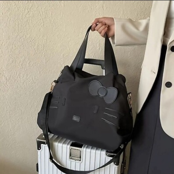 Hello Kitty Black Tote with Bow Accent duffle crossbody bag removable strap - Picture 14 of 16